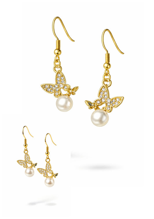 Super schöne Ohrringe in Goldoptik mit Schmetterling, Perle und Strasssteinen.